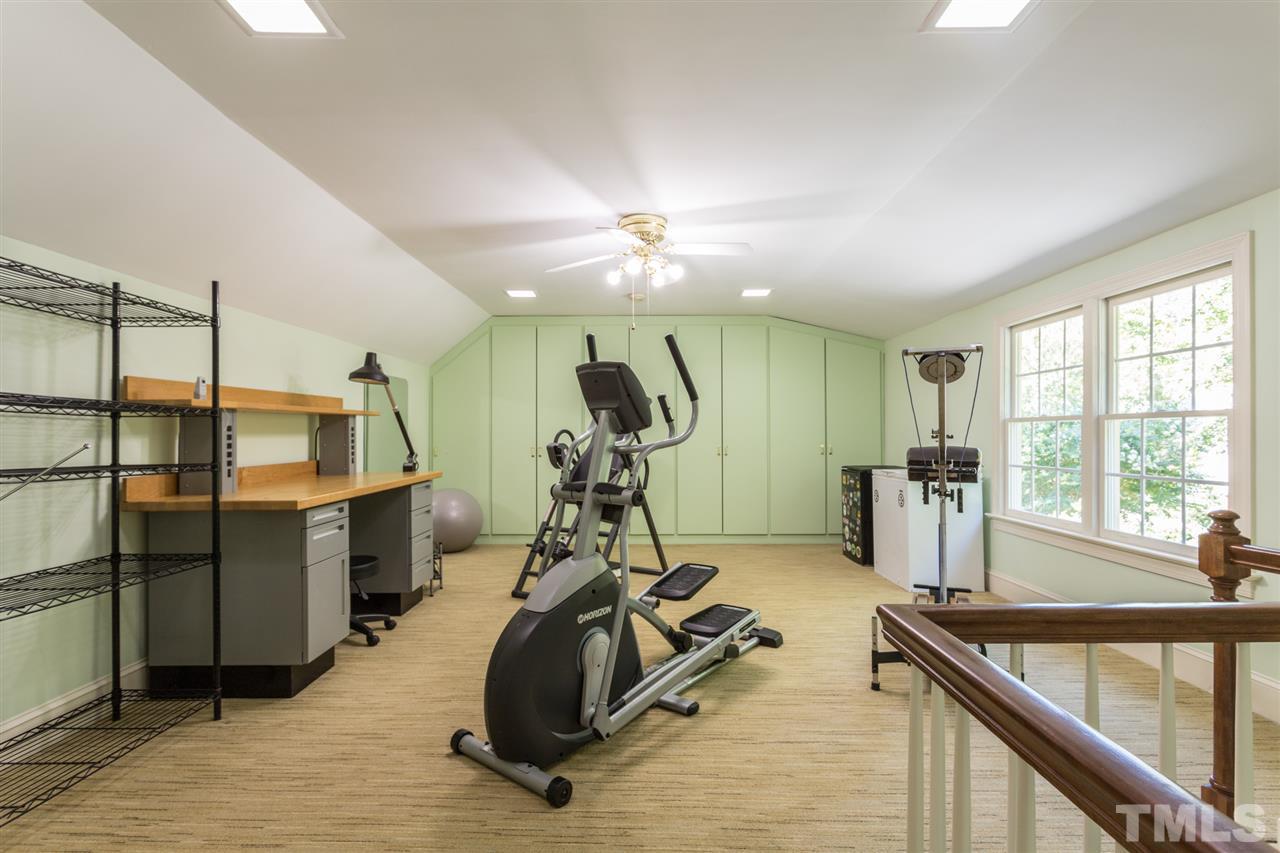 1812 Albacore Lane Raleigh, NC 27612 - Photo 21 of 30 a view of a room with gym equipment