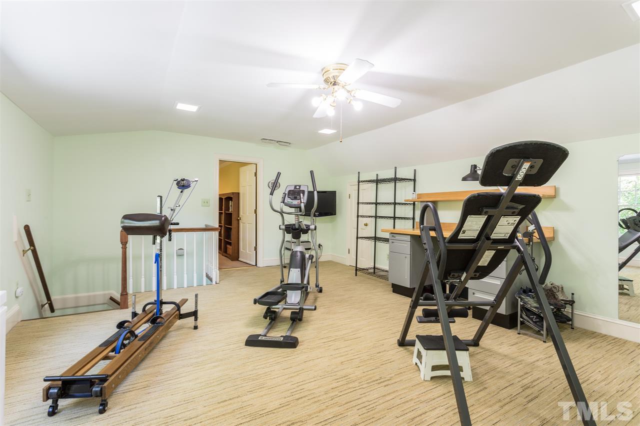 1812 Albacore Lane Raleigh, NC 27612 - Photo 22 of 30 a view of a room with gym equipment