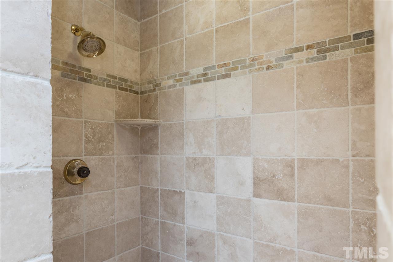 1812 Albacore Lane Raleigh, NC 27612 - Photo 26 of 30 a bathroom with a shower