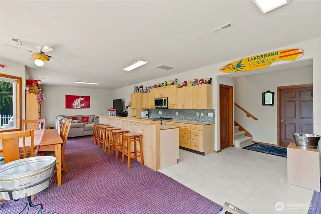 a bedroom with furniture and a window