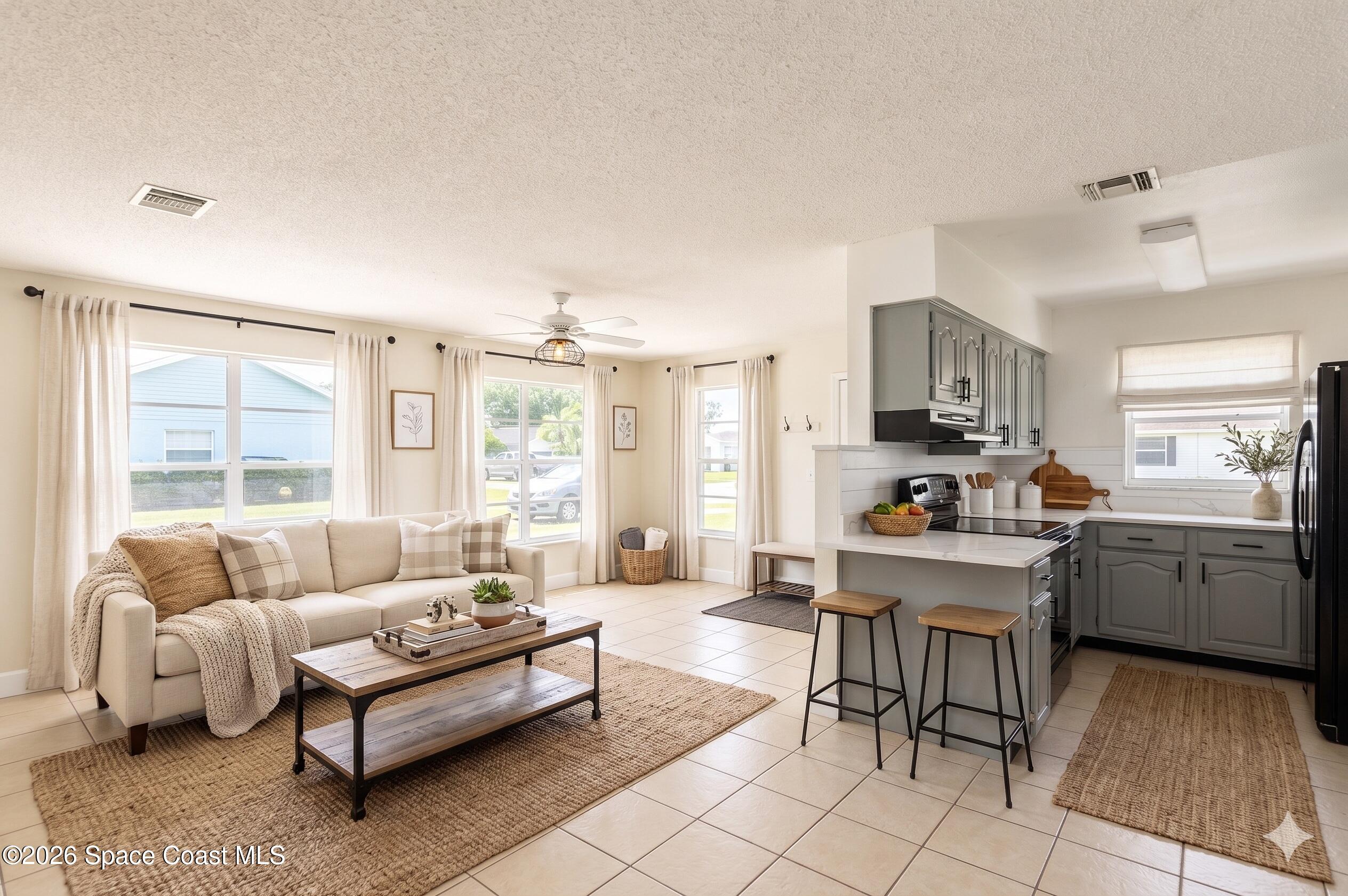 2882 Pembroke Road Melbourne, FL 32935 - Photo 6 of 26 7-Family Room Kitchen Transformed