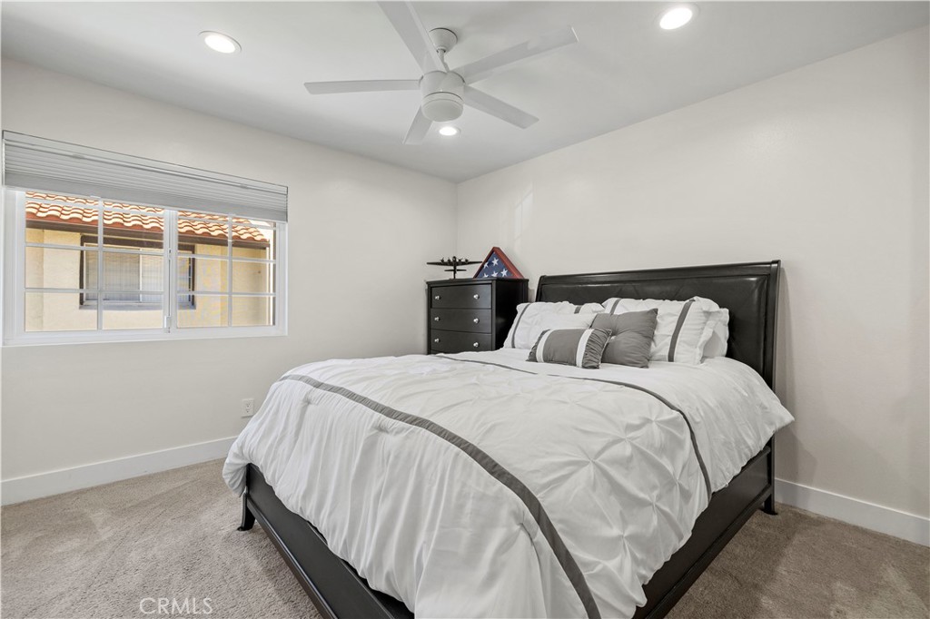 5602 Las Virgenes Road, Unit 79 Calabasas, CA 91302 - Photo 24 of 56 a bedroom with a bed and a window