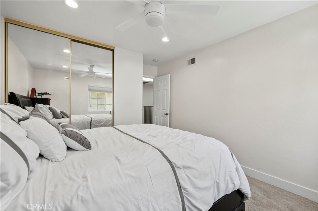 5602 Las Virgenes Road, Unit 79 Calabasas, CA 91302 - Photo 25 of 56 a large bed in a white room