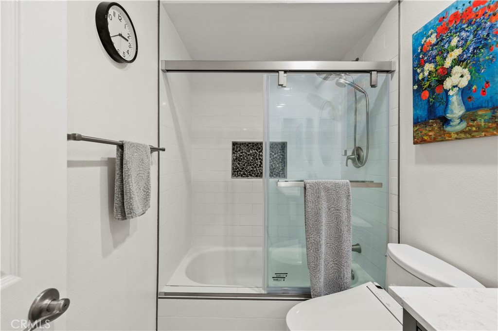 5602 Las Virgenes Road, Unit 79 Calabasas, CA 91302 - Photo 28 of 56 a bathroom with a toilet and a shower