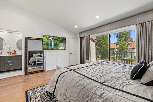 a bathroom with a sink a mirror and a bathtub