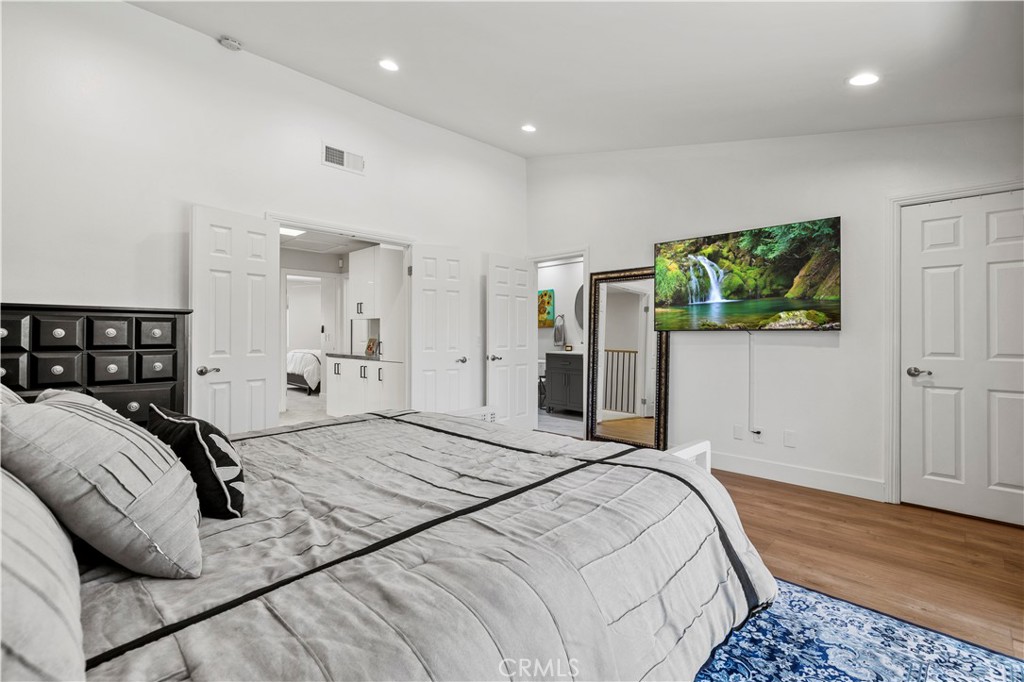 5602 Las Virgenes Road, Unit 79 Calabasas, CA 91302 - Photo 39 of 56 a bedroom with a bed and a couch