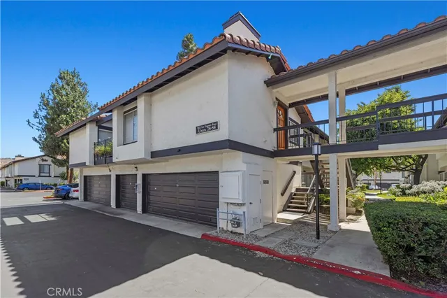 an aerial view of a house with outdoor space