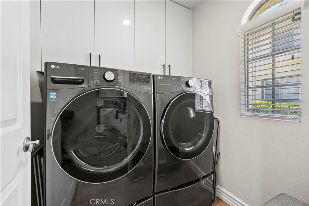 5602 Las Virgenes Road, Unit 79 Calabasas, CA 91302 - Photo 50 of 56 a utility room with dryer and washer
