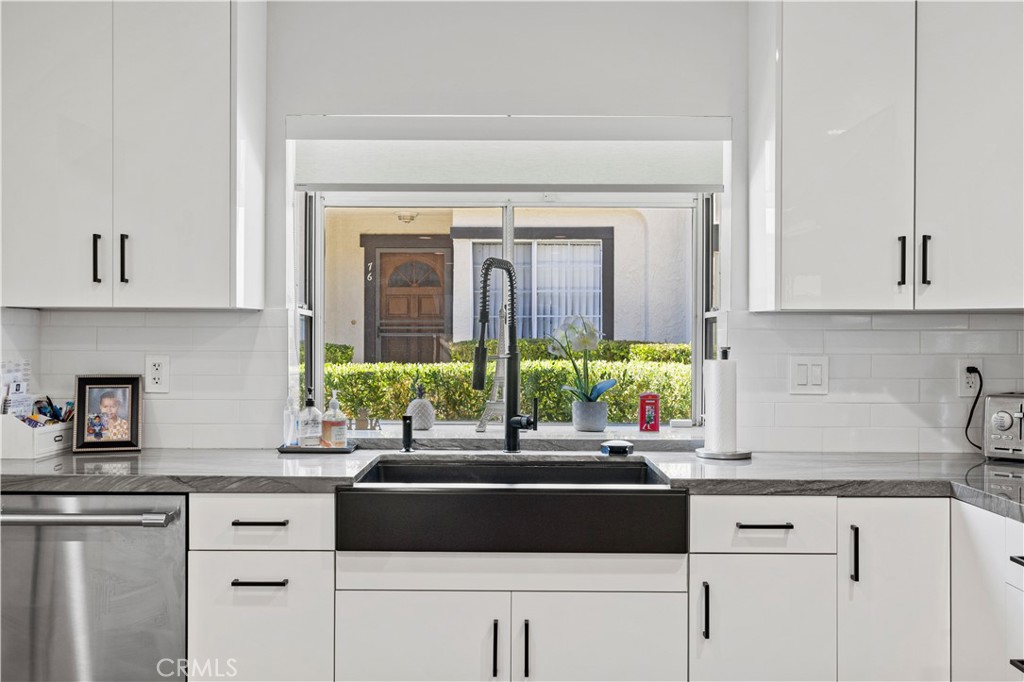 5602 Las Virgenes Road, Unit 79 Calabasas, CA 91302 - Photo 5 of 56 a kitchen with a sink and cabinets