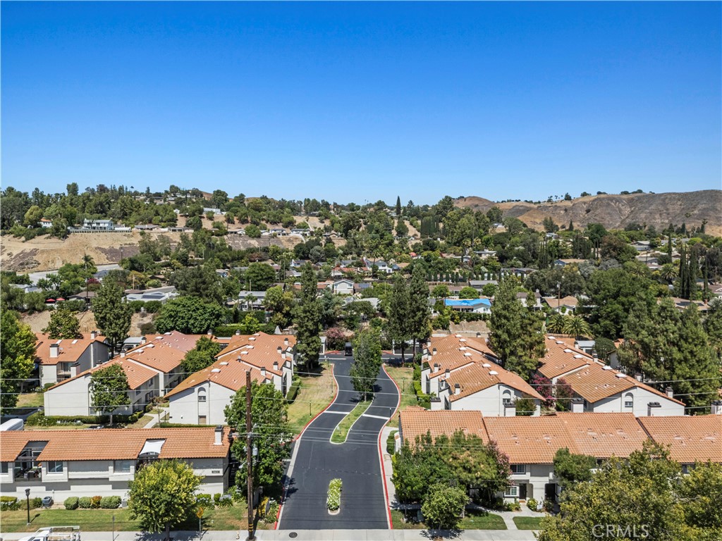 5602 Las Virgenes Road, Unit 79 Calabasas, CA 91302 - Photo 51 of 56 an aerial view of residential houses with outdoor space