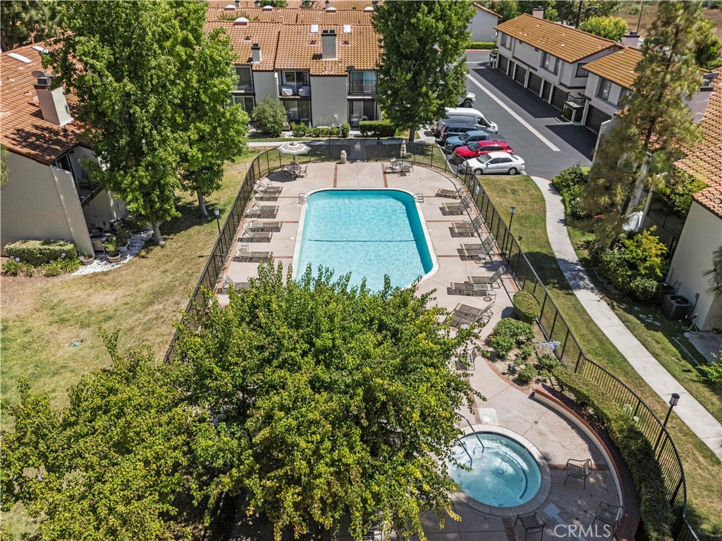 5602 Las Virgenes Road, Unit 79 Calabasas, CA 91302 - Photo 52 of 56 a aerial view of a house with a yard and garden