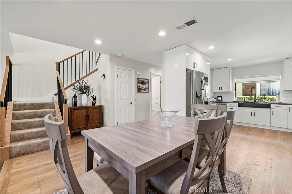 5602 Las Virgenes Road, Unit 79 Calabasas, CA 91302 - Photo 8 of 56 a view of a dining room with furniture