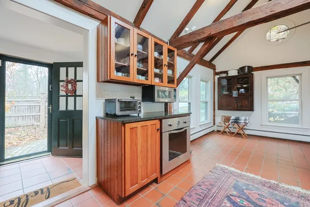 a view of a dining room with furniture window and outside view