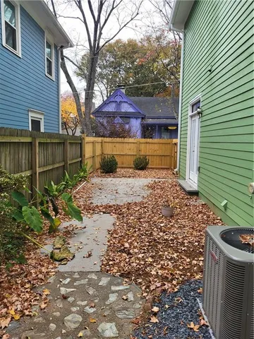 a view of a back yard of the house