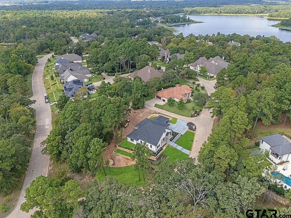 4504 Triggs Trace Tyler, TX 75709 - Photo 11 of 46 an aerial view of a house with a garden