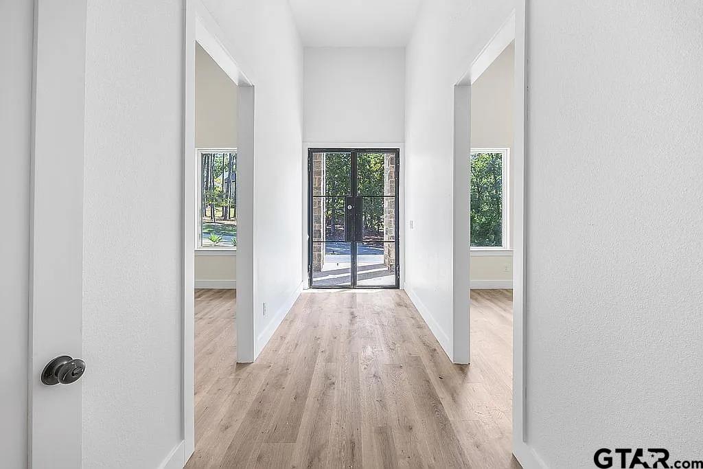 4504 Triggs Trace Tyler, TX 75709 - Photo 12 of 46 wooden floor in a room next to a window