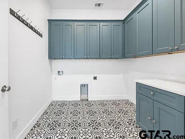 4504 Triggs Trace Tyler, TX 75709 - Photo 19 of 46 a bathroom with a sink a vanity and a window