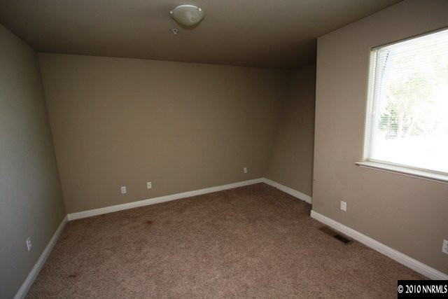 2050 Dickerson Road Reno, NV 89503 - Photo 9 of 13 a view of an empty room with a window