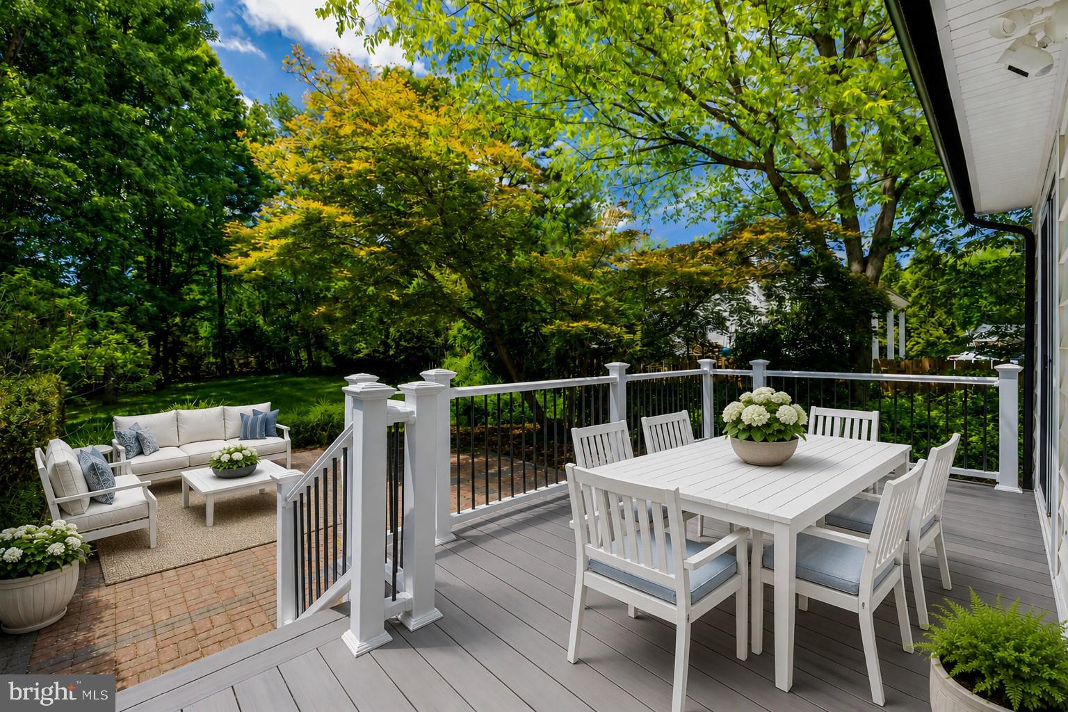 822 Walker Road Great Falls, VA 22066 - Photo 16 of 20 a view of a dinning table and chairs in the patio