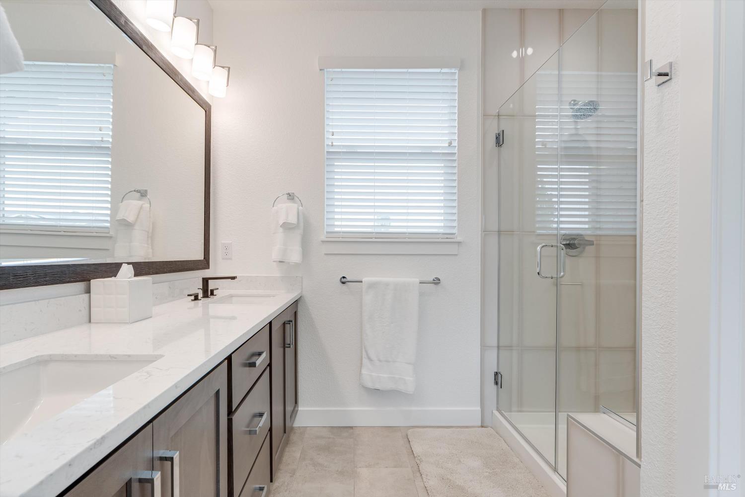 349 Vinterra Court Napa, CA 94559 - Photo 25 of 53 Quartz Countertops on the Dual Vanity, Stall Shower, and Water Closet