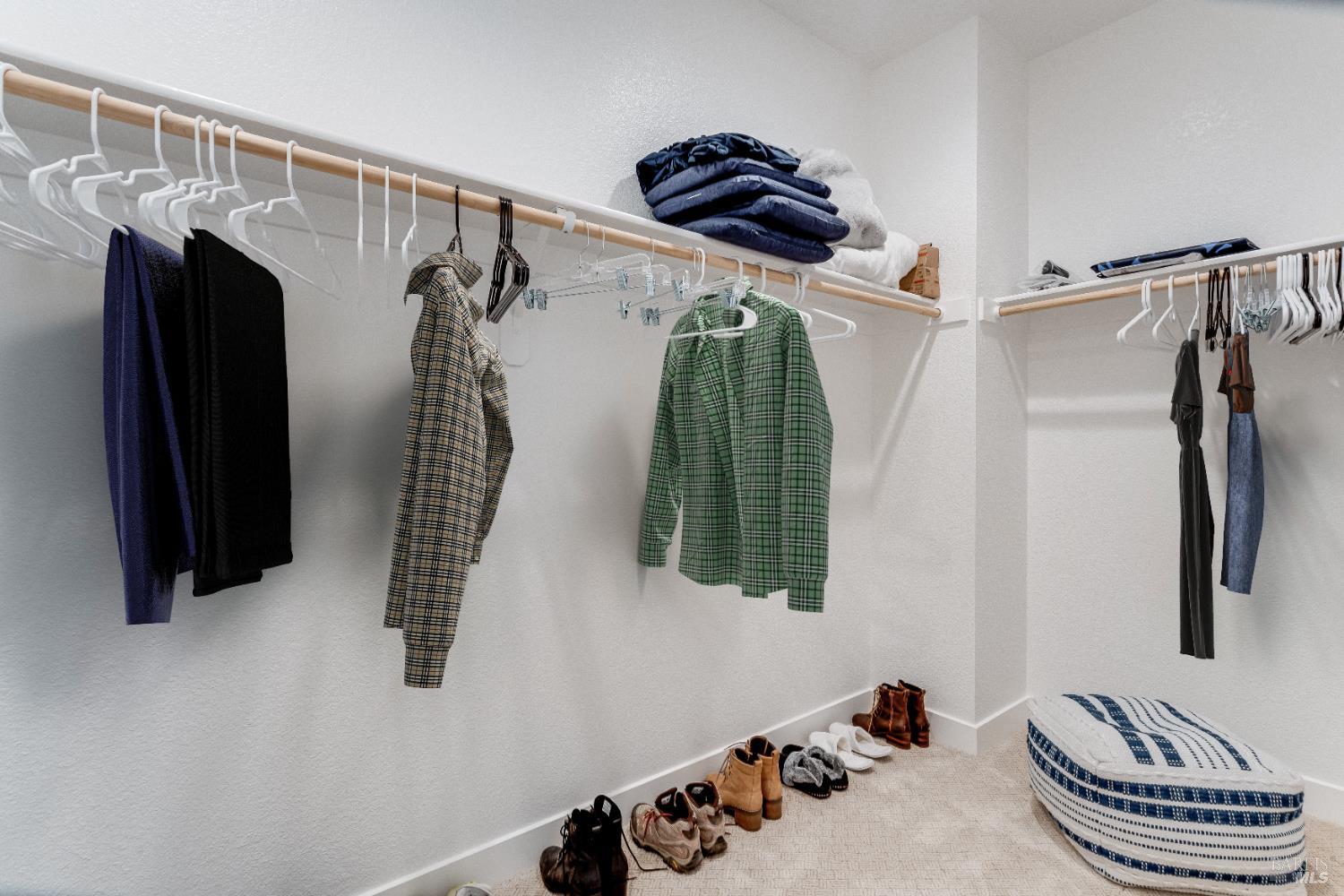 349 Vinterra Court Napa, CA 94559 - Photo 27 of 53 Primary Walk In Closet with virtual clothing hanging