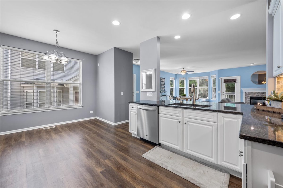 371 Ridge Road North Aurora, IL 60542 - Photo 11 of 21 a kitchen with stainless steel appliances granite countertop a stove and cabinets