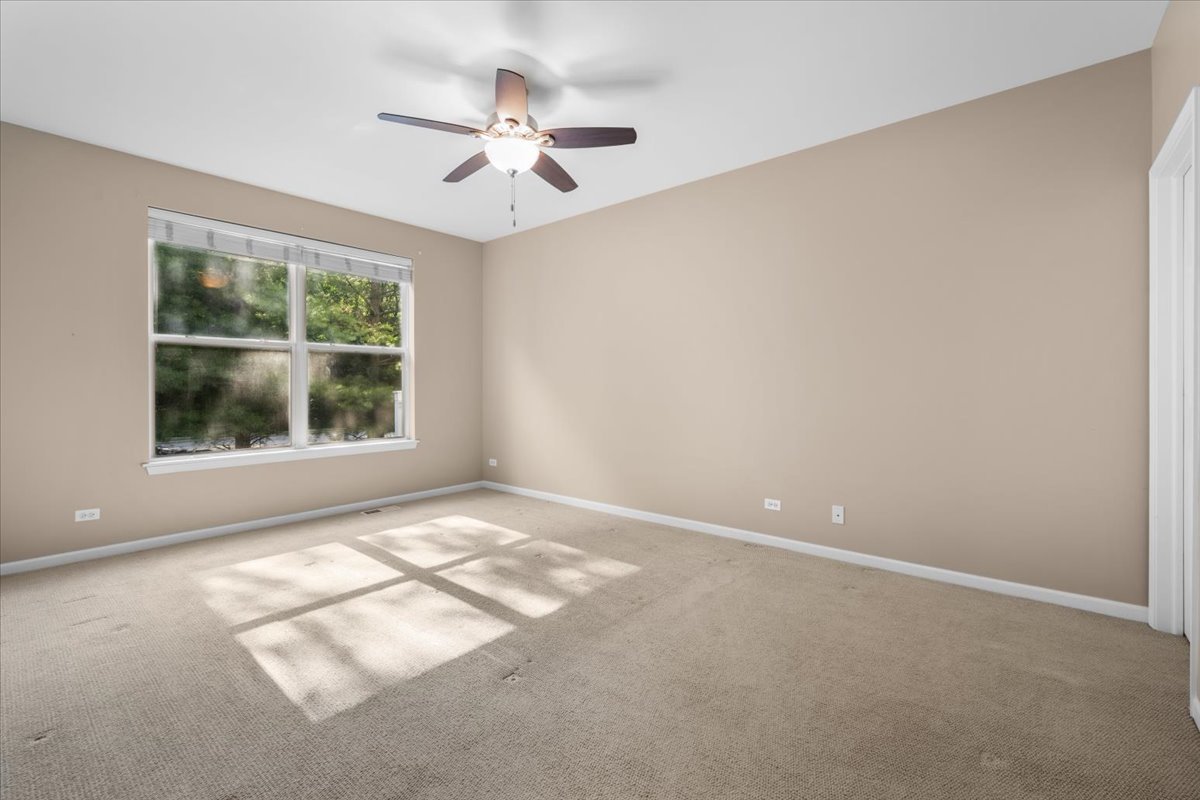 371 Ridge Road North Aurora, IL 60542 - Photo 12 of 21 a view of an empty room with a window
