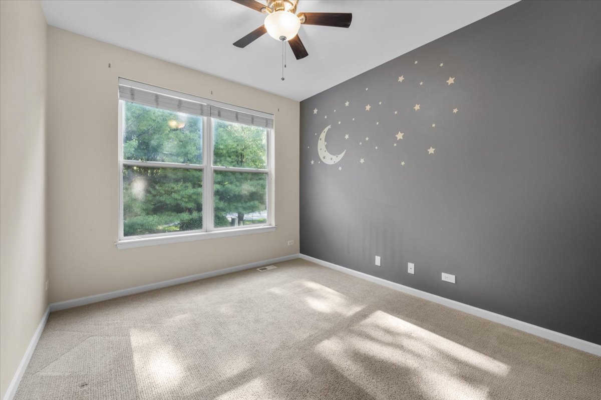 371 Ridge Road North Aurora, IL 60542 - Photo 14 of 21 a view of an empty room with a window