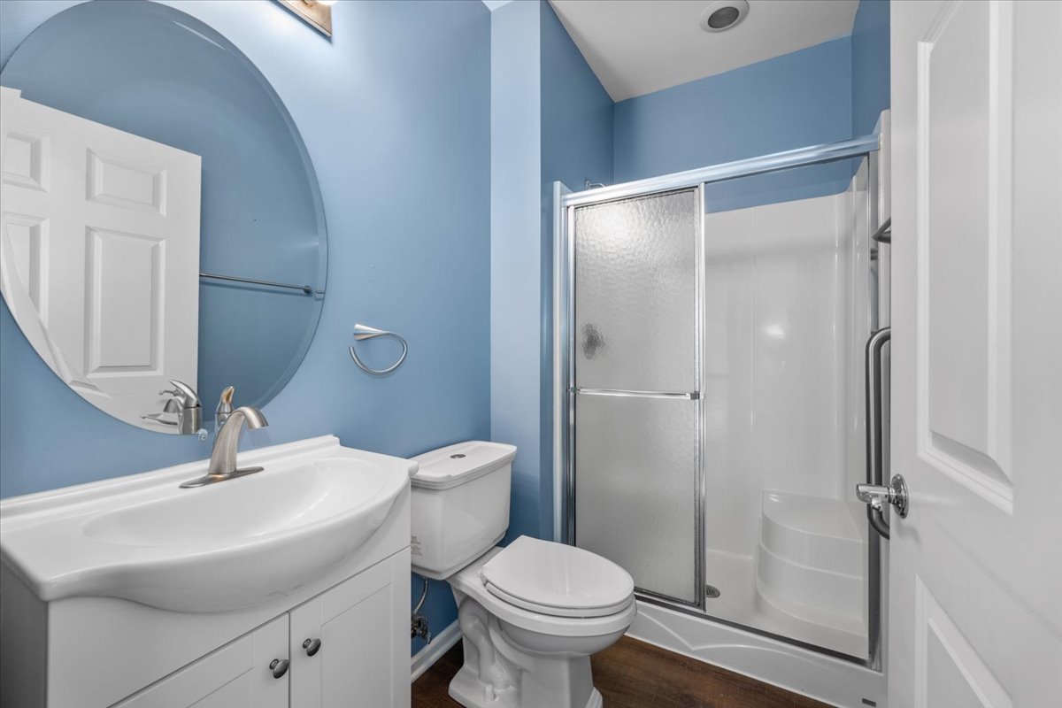 371 Ridge Road North Aurora, IL 60542 - Photo 15 of 21 a bathroom with a sink toilet and shower