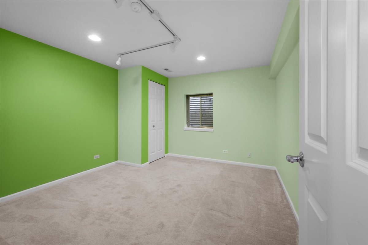 371 Ridge Road North Aurora, IL 60542 - Photo 16 of 21 a view of an empty room with a window