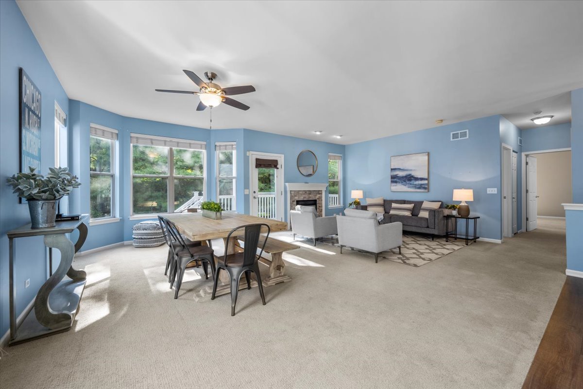 371 Ridge Road North Aurora, IL 60542 - Photo 3 of 21 a living room with furniture and potted plants