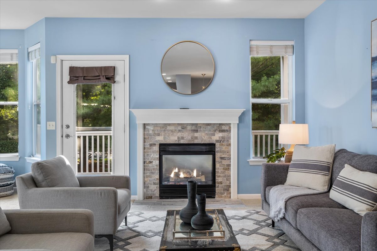 371 Ridge Road North Aurora, IL 60542 - Photo 5 of 21 a living room with furniture a window and a fireplace