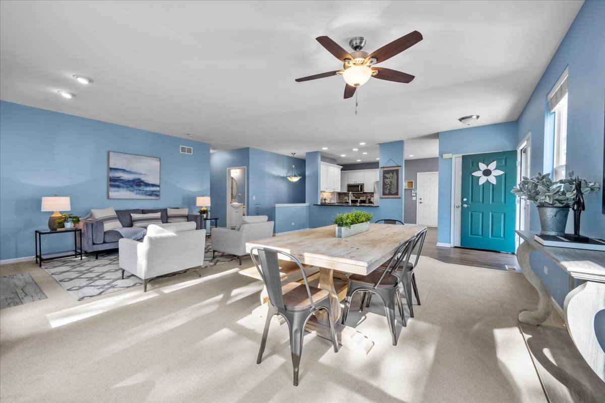 371 Ridge Road North Aurora, IL 60542 - Photo 7 of 21 a dining room with furniture and a large window