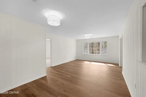 a view of a room with a window