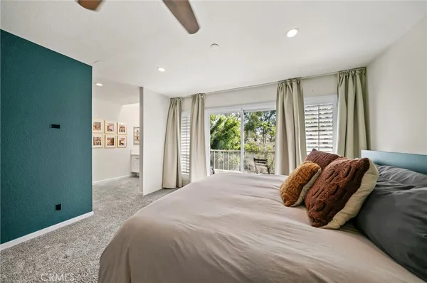 a view of balcony with wooden floor and fence