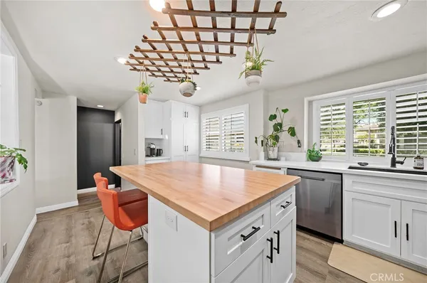 a very nice looking dining room with a table and chairs