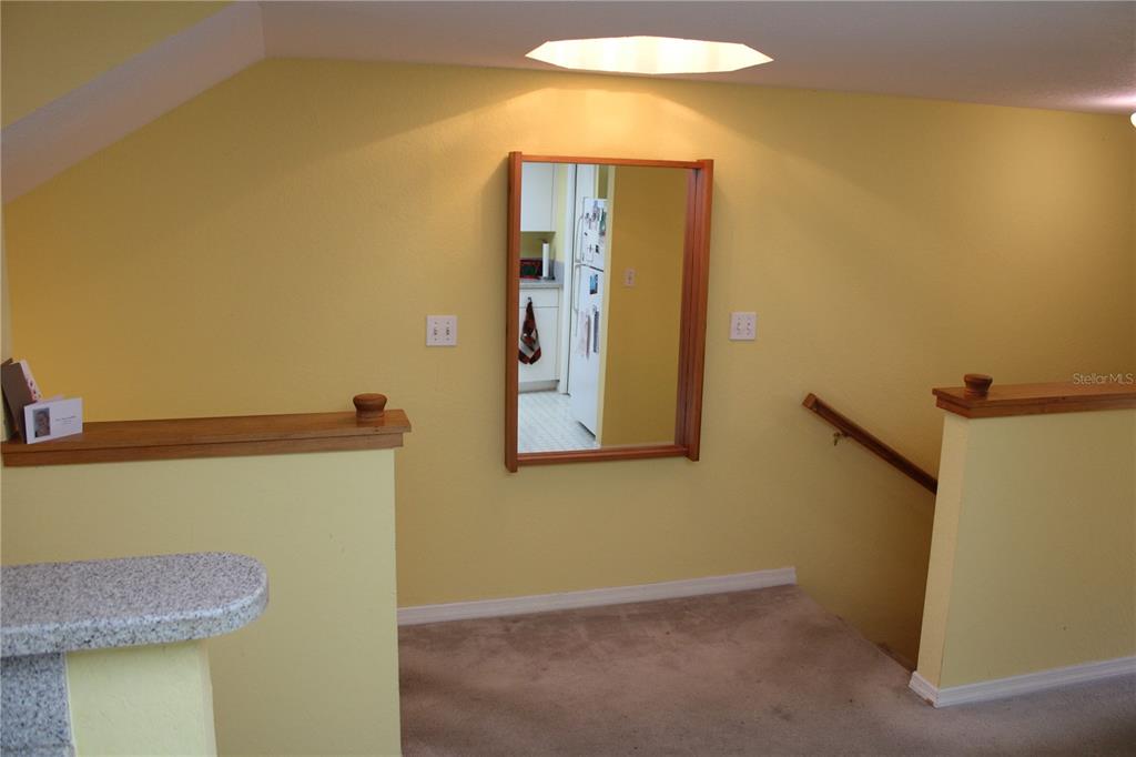 9722 Indian Key Trail, Unit 116 Seminole, FL 33776 - Photo 3 of 65 a view of a hallway with entryway