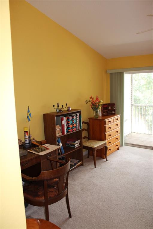 9722 Indian Key Trail, Unit 116 Seminole, FL 33776 - Photo 32 of 65 a workspace with furniture and a window