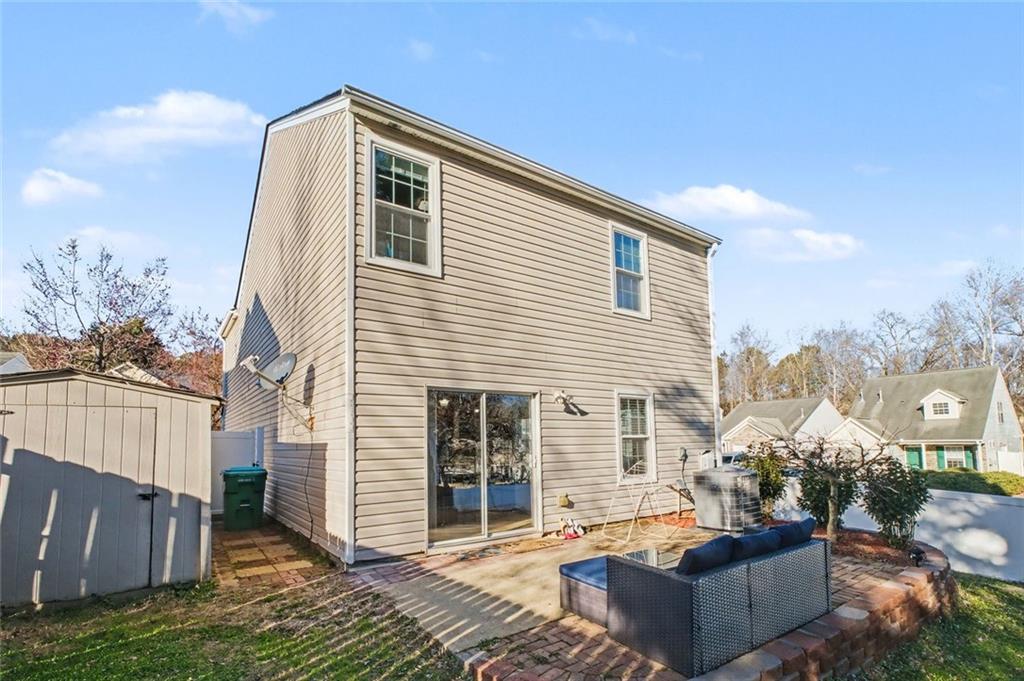 151 Ilex Drive Canton, GA 30114 - Photo 11 of 43 a backyard of a house with sofas