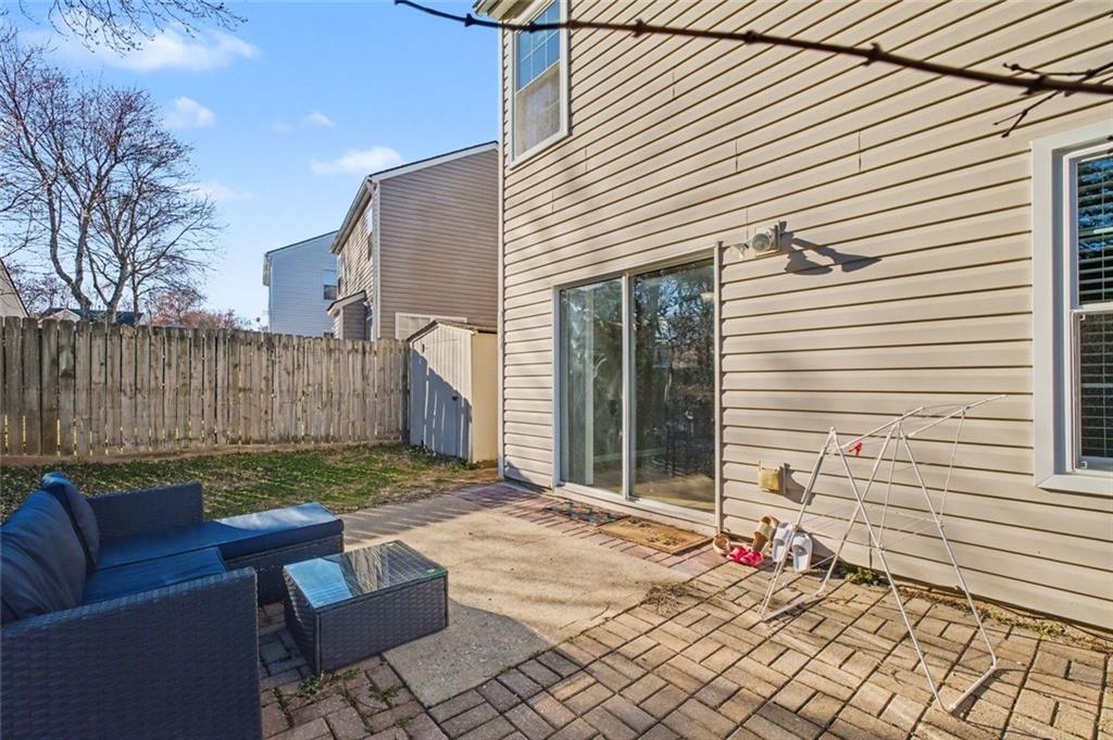 151 Ilex Drive Canton, GA 30114 - Photo 14 of 43 a backyard of a house with seating space