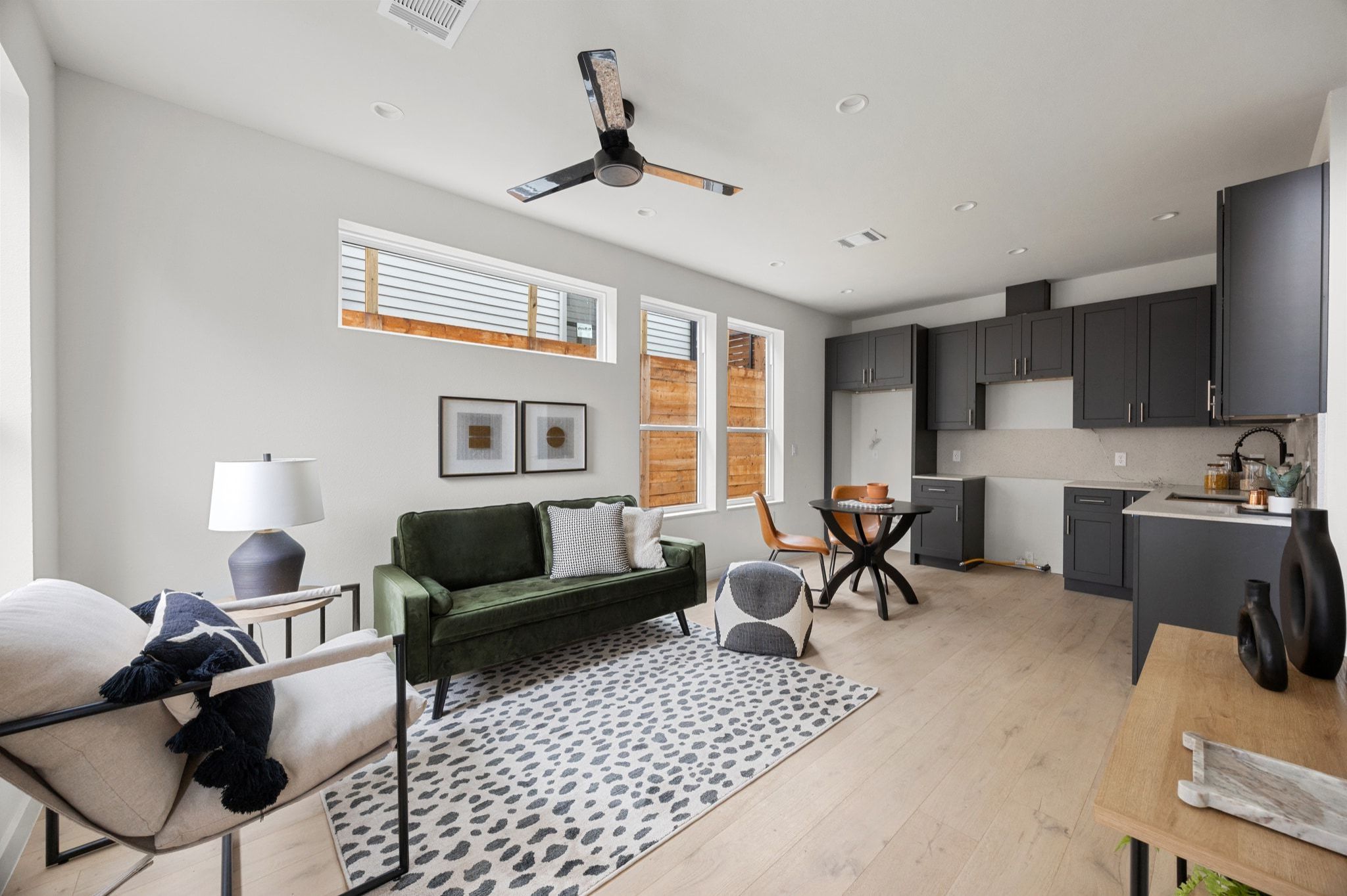 1709 Maple Avenue, Unit 2B Austin, TX 78702 - Photo 1 of 28 a living room with furniture a flat screen tv and a window