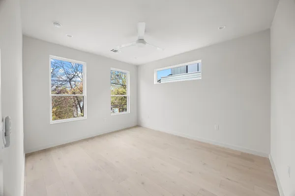 an empty room with windows