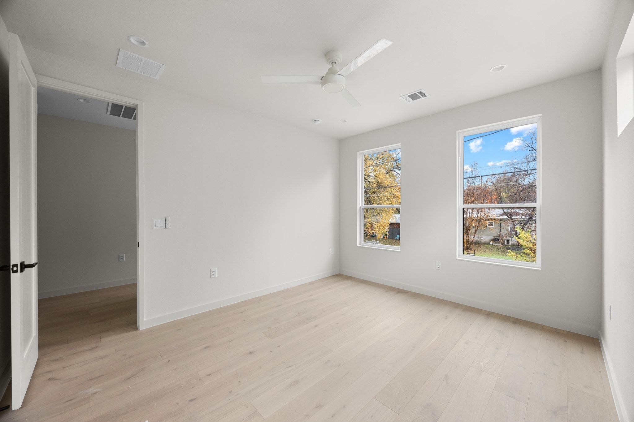 1709 Maple Avenue, Unit 2B Austin, TX 78702 - Photo 18 of 28 a view of an empty room with a window