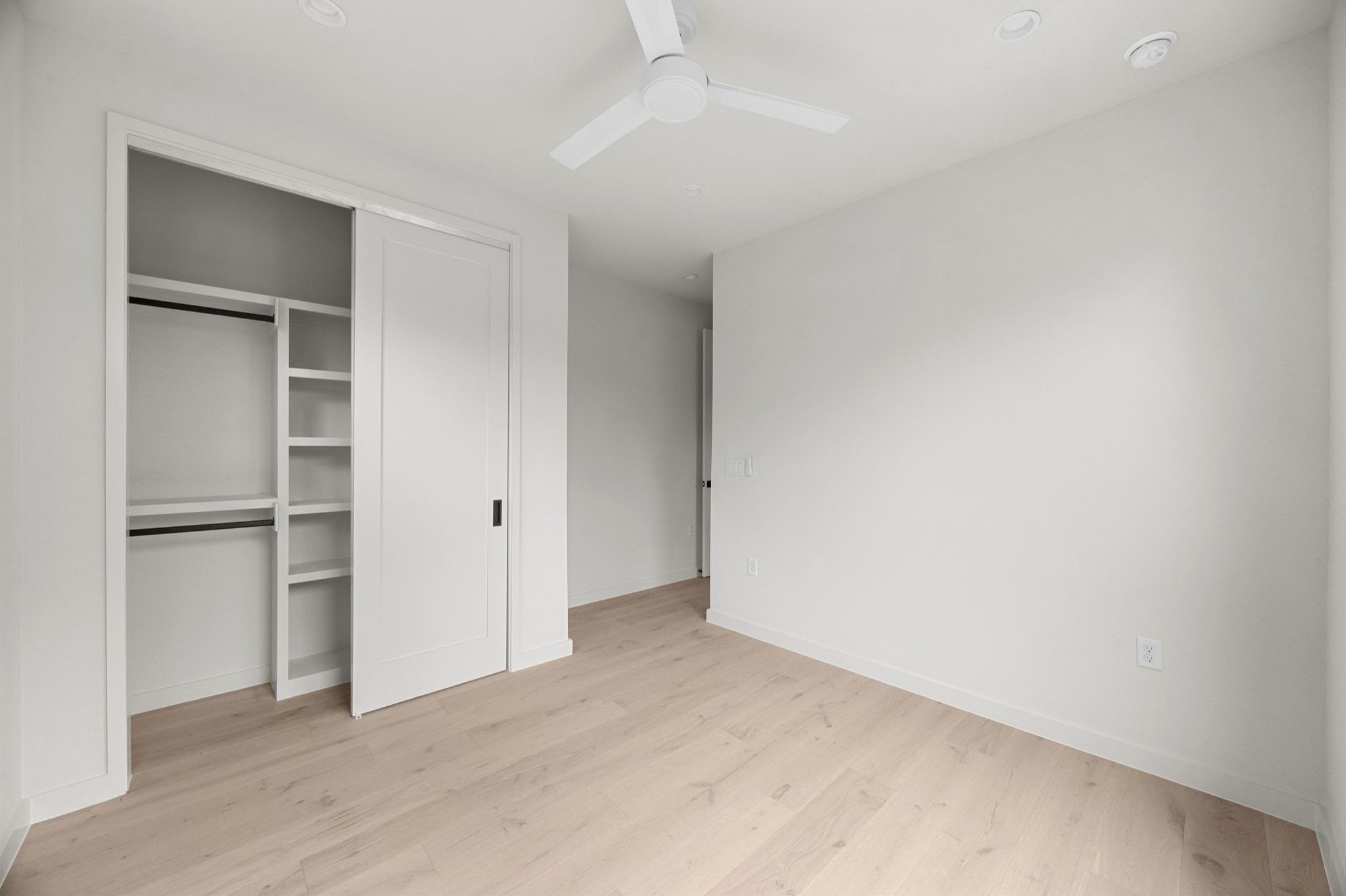 1709 Maple Avenue, Unit 2B Austin, TX 78702 - Photo 24 of 28 a view of an empty walk in closet with empty racks