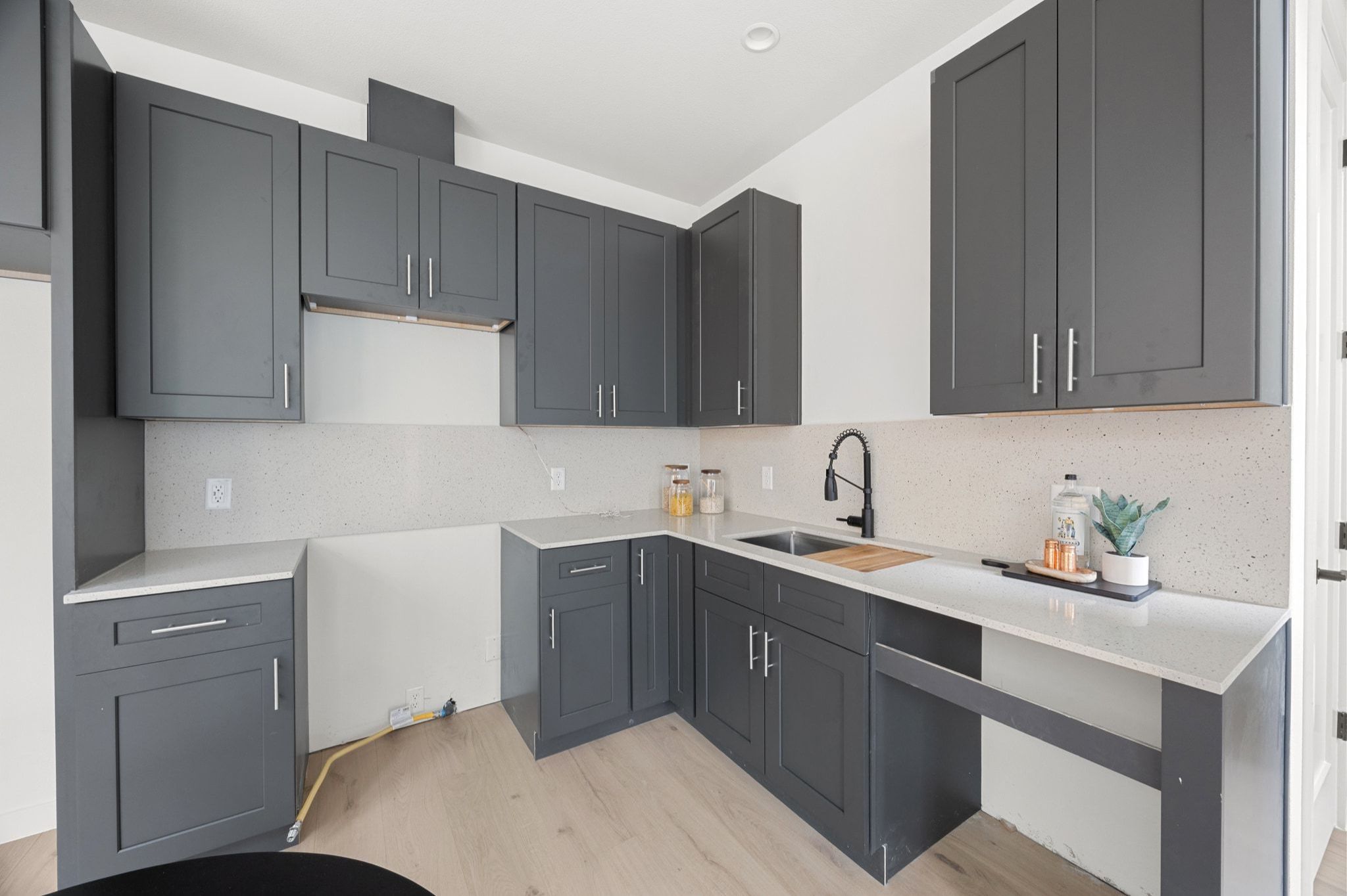 1709 Maple Avenue, Unit 2B Austin, TX 78702 - Photo 9 of 28 a kitchen with a sink cabinets and appliances