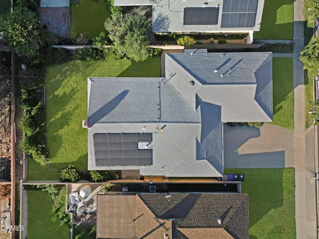 an aerial view of residential house with outdoor space