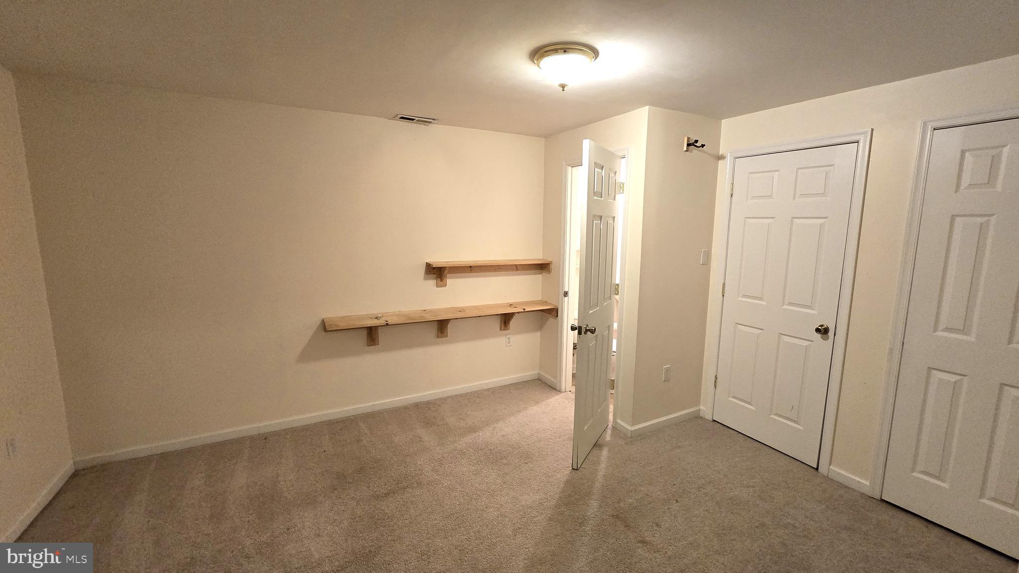 310 Henrico Road Front Royal, VA 22630 - Photo 60 of 71 Basement Guest Room with Half Bath