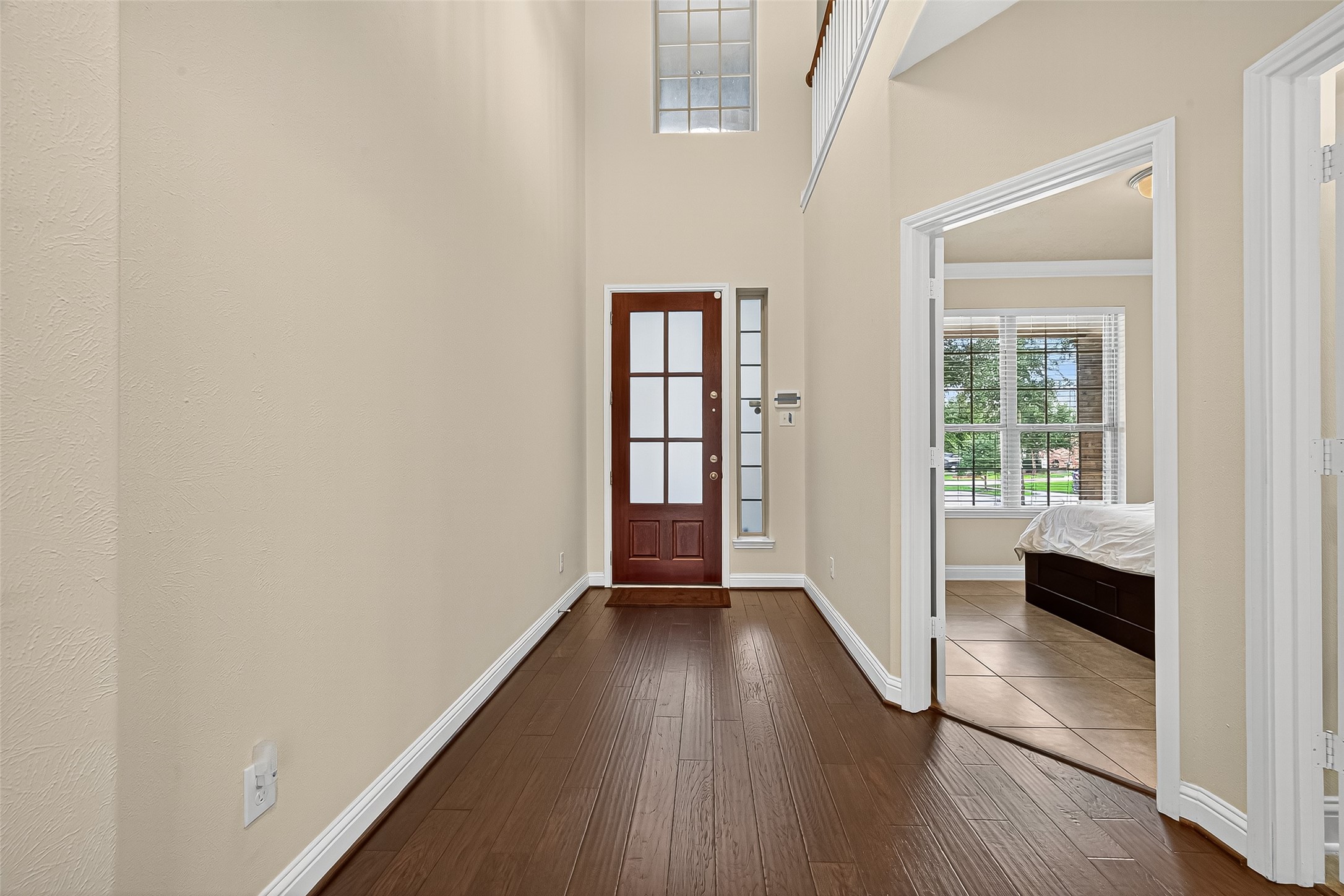 8107 Lockridge Terrace Lane Cypress, TX 77433 - Photo 7 of 50 Feel the warmth before you even step inside. This beautiful, light-letting front door and tall sidelight fill your entryway with sunshine, offering a cheerful greeting every single day.