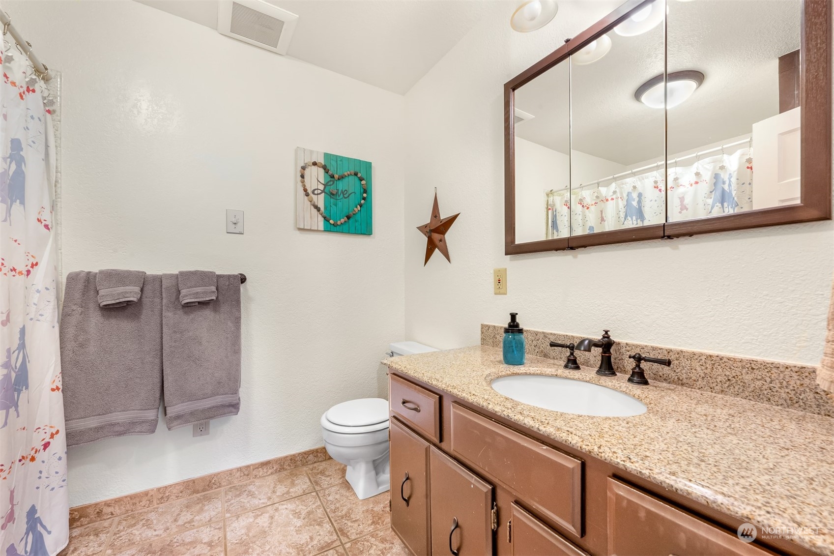 3941 Loomis Trail Road Blaine, WA 98230 - Photo 11 of 40 a bathroom with a granite countertop sink toilet and shower