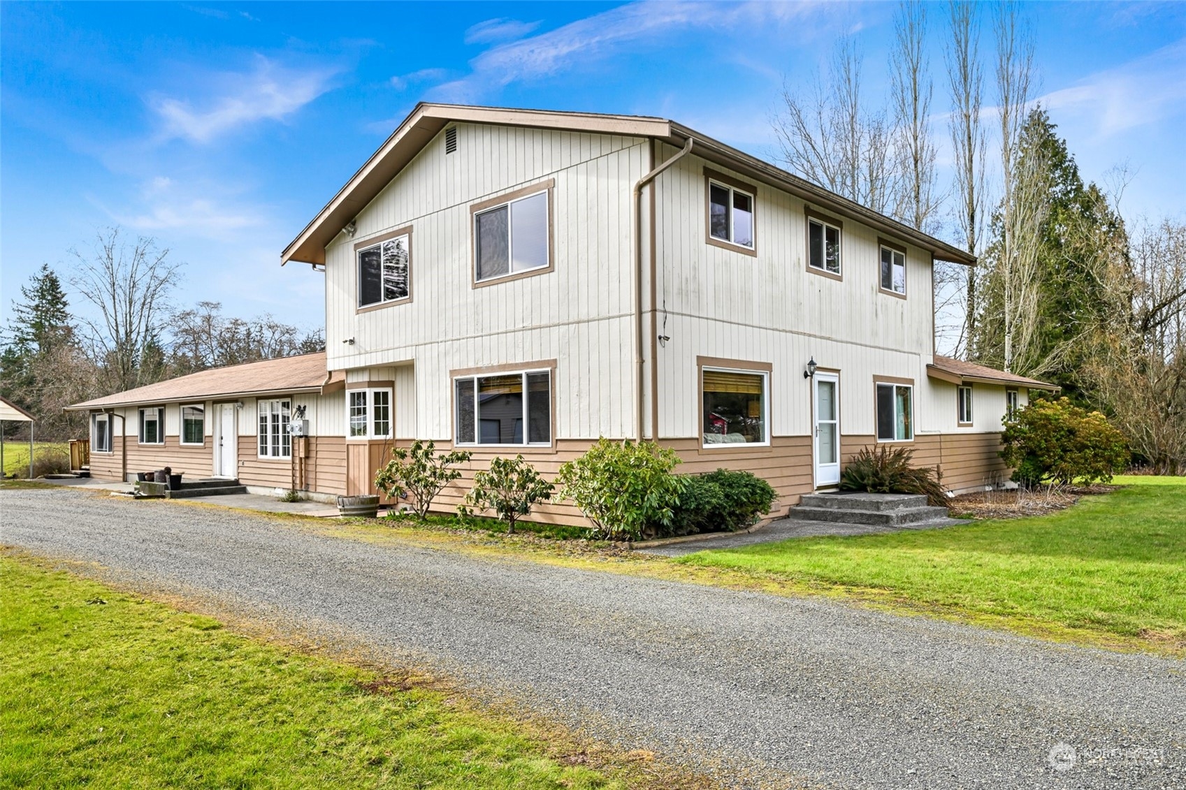 3941 Loomis Trail Road Blaine, WA 98230 - Photo 4 of 40 a front view of a house with a yard